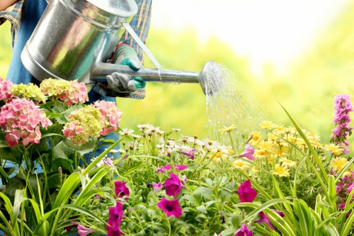 Gardening team managing green waste responsibly